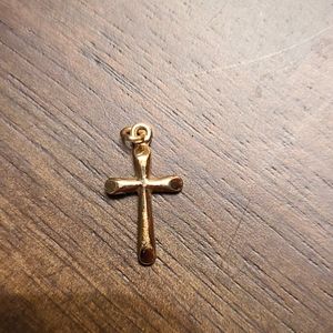 14 Karat gold small cross pendant